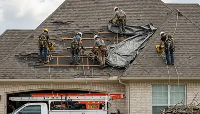 Arbor Tree Care crew cleaning storm damage in Overland Park, KS after severe weather cleanup